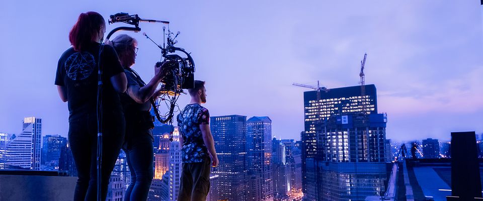 Behind the scenes of a take in which the LED wall of a rented virtual production stage is used as a cities skyline.