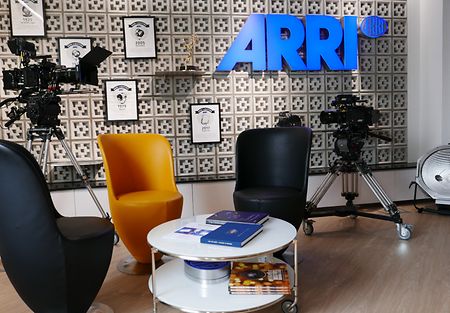 ARRI in Hong Kong - Inviting lobby with seating and prominently displayed awards and ARRI logo in the back surrounded by camera & lighting equipment